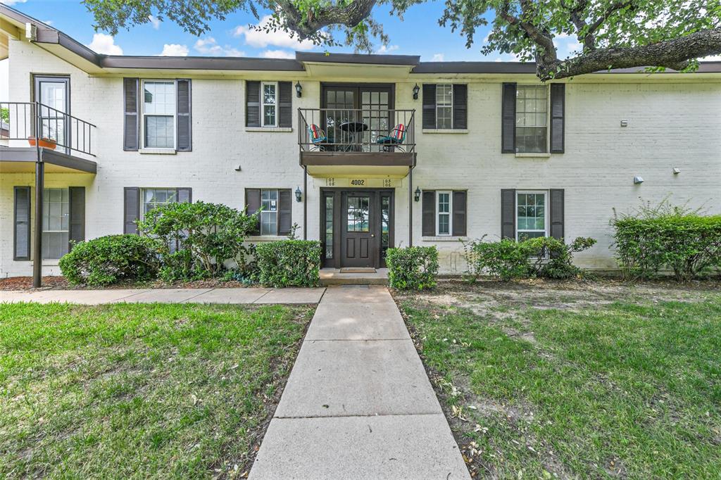 4002 Ridglea Country Club Drive Fort Worth, TX 76126 - Photo 1 of 36 a front view of a house with garden