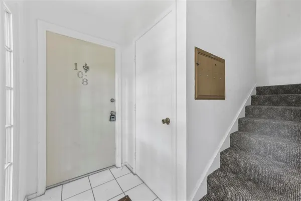 a view of an entryway with staircase