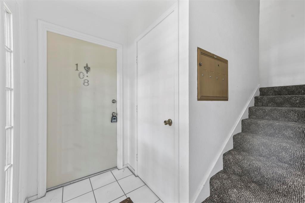4002 Ridglea Country Club Drive Fort Worth, TX 76126 - Photo 2 of 36 a view of an entryway with staircase