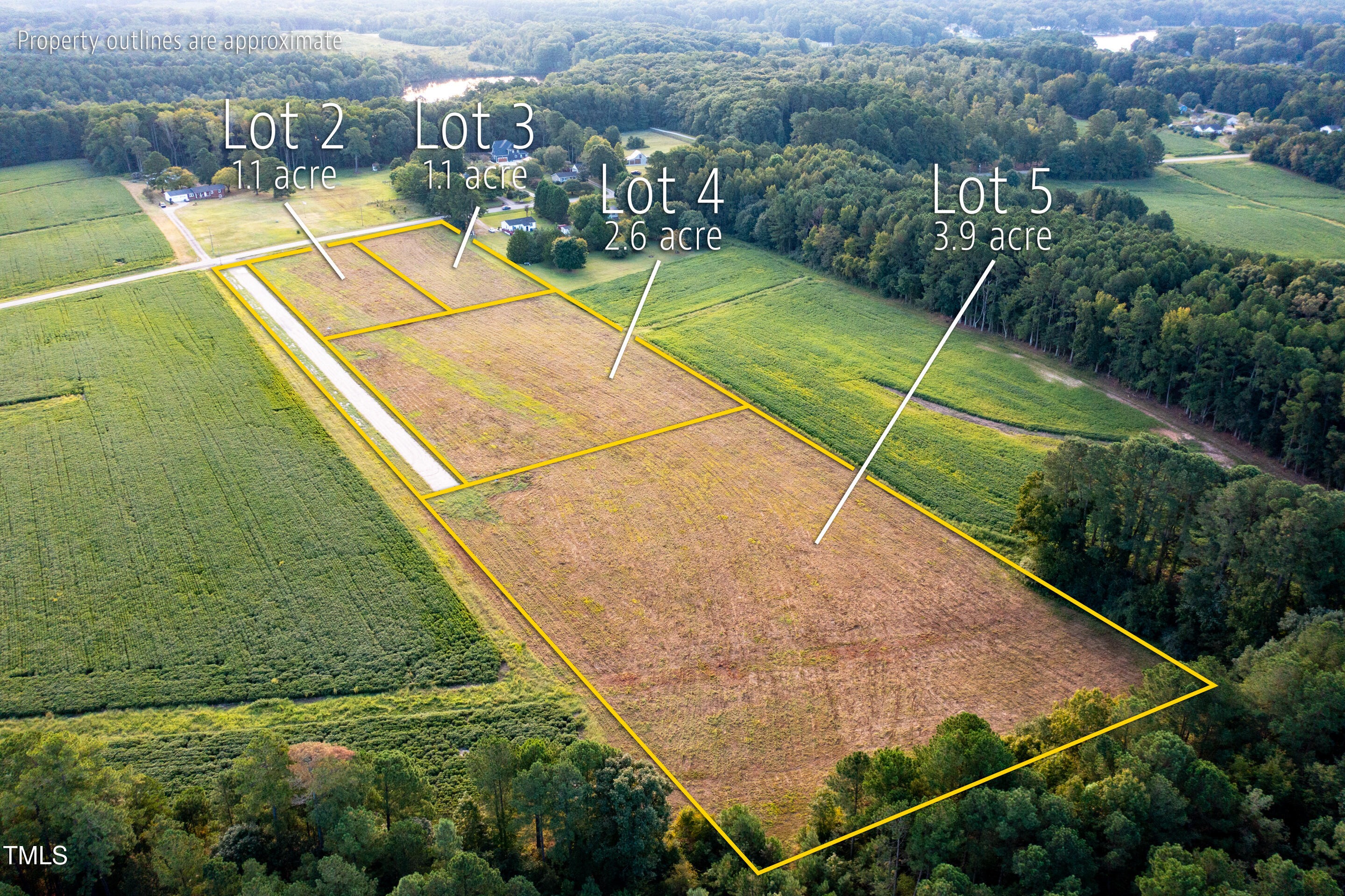 5 Oakley Road Zebulon, NC 27597 - Photo 2 of 3 a view of a backyard