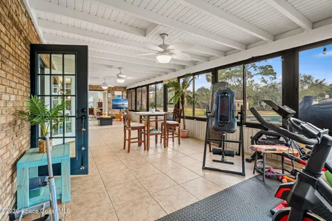 a bedroom with a large bed and a dresser