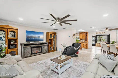 a view of a livingroom with furniture and window