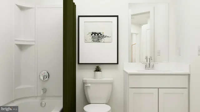 a bathroom with a toilet sink and shower