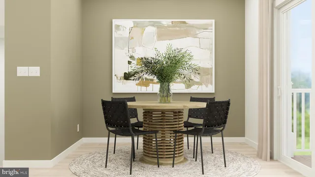 a view of a dining room with furniture and a window