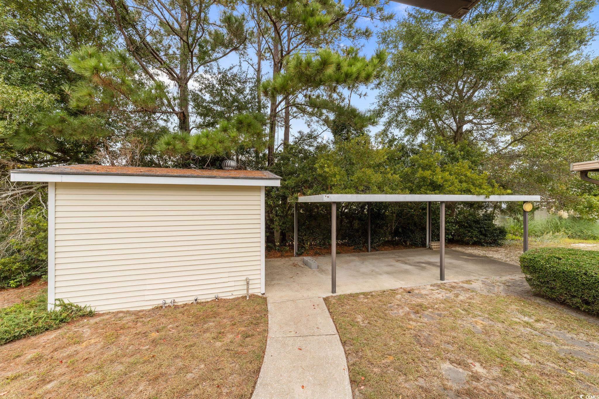 894 South Marlin Circle Murrells Inlet, SC 29576 - Photo 21 of 40 View of green lawn