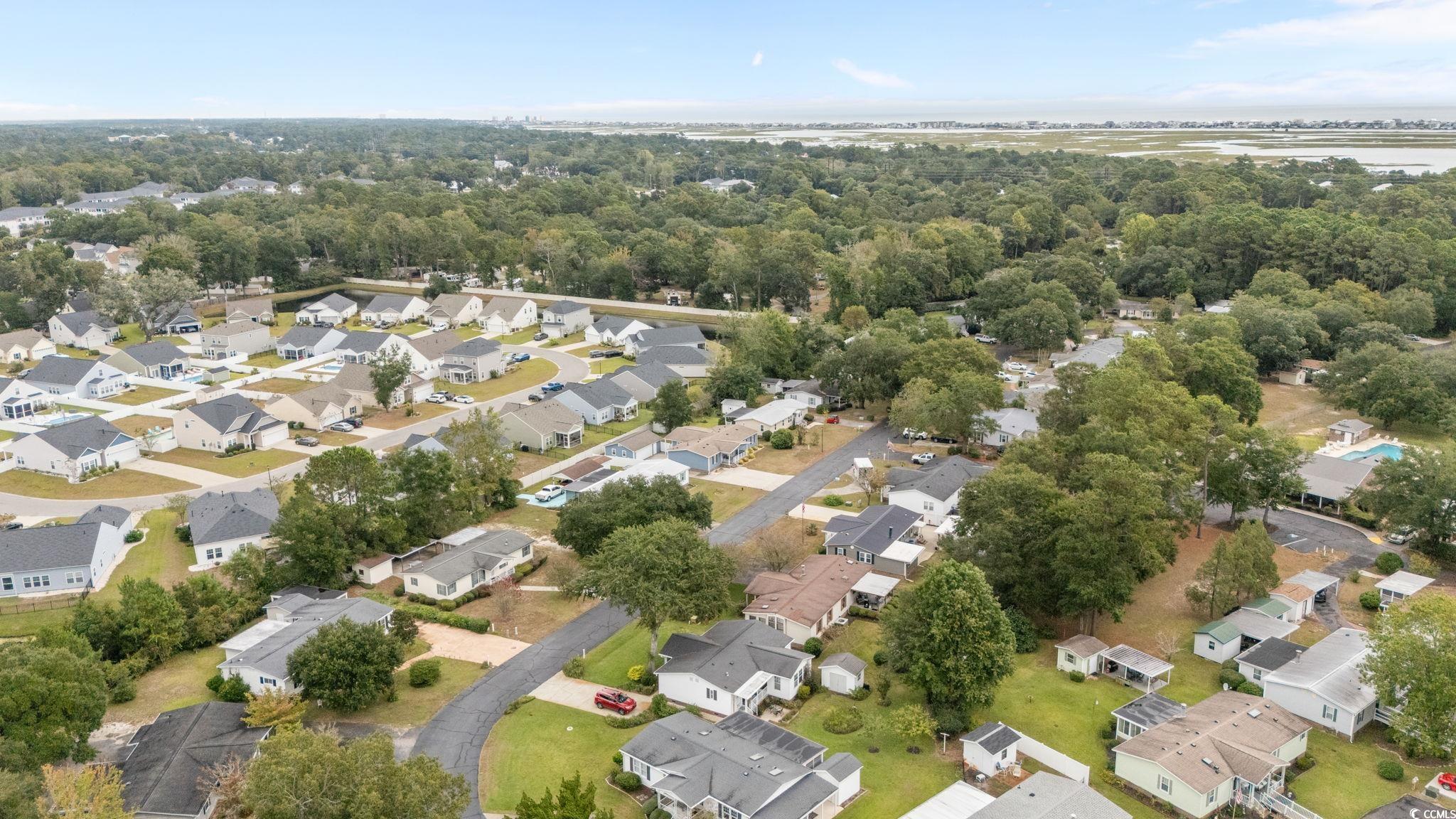 894 South Marlin Circle Murrells Inlet, SC 29576 - Photo 30 of 40 Aerial view of residential area with a large body of water