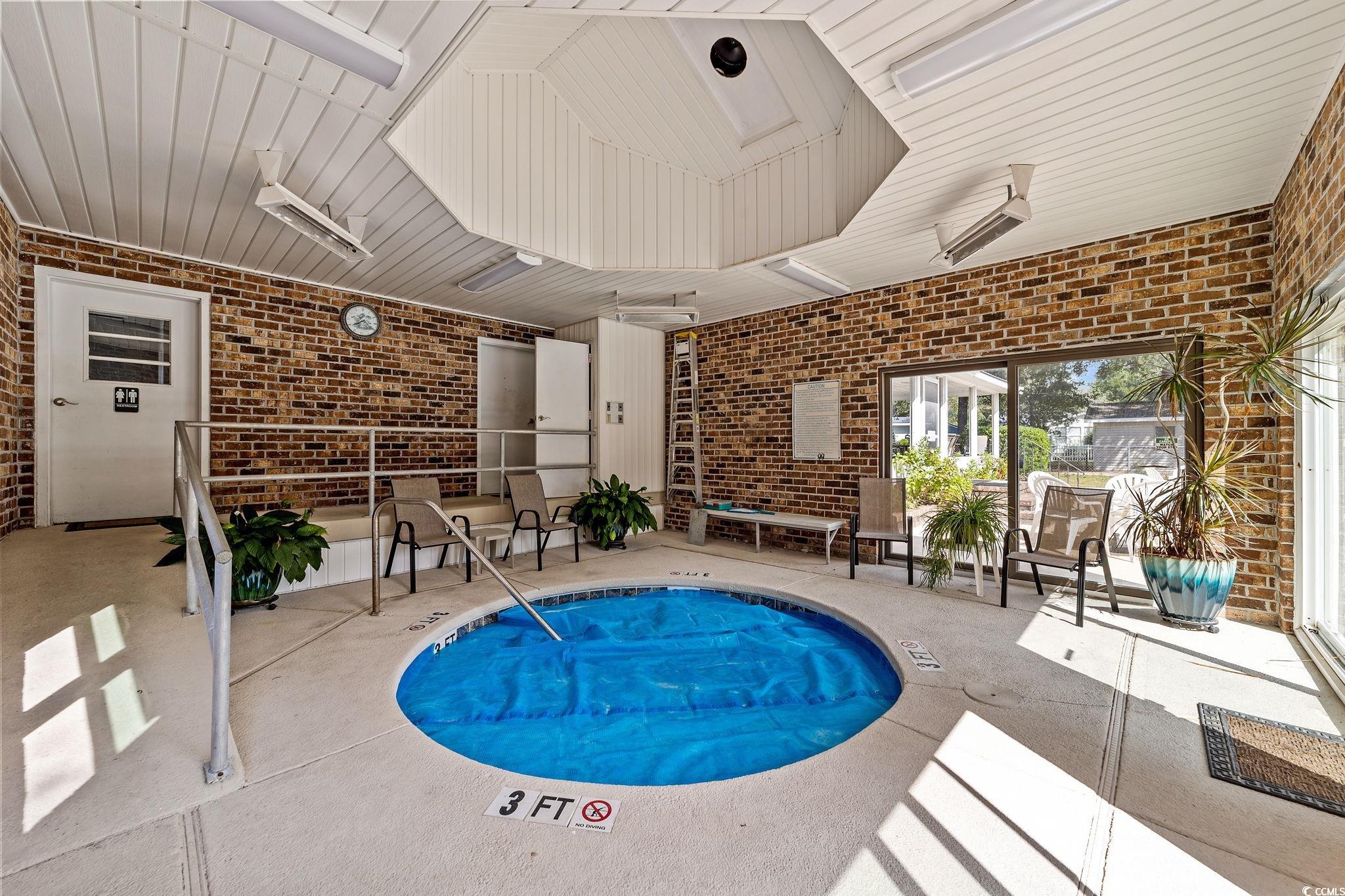 894 South Marlin Circle Murrells Inlet, SC 29576 - Photo 38 of 40 View of swimming pool with a pool and a patio