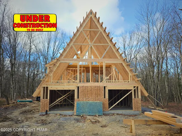 a view of small white house