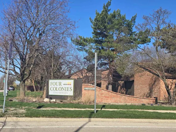 a sign on the side of a road