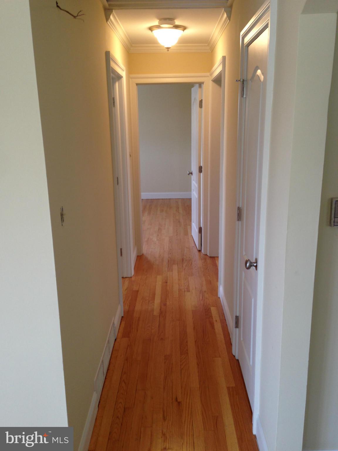 868 Jordan Springs Road Stephenson, VA 22656 - Photo 17 of 30 Hallway to Beds & Bath w/ Whole House Attic Fan