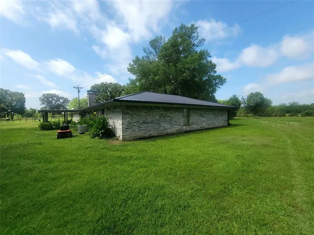 a view of a backyard with a garden