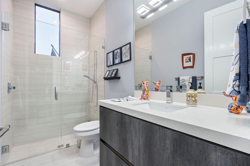 13500 Stirling Road Southwest Ranches, FL 33330 - Photo 27 of 72 a bathroom with a sink a toilet and shower