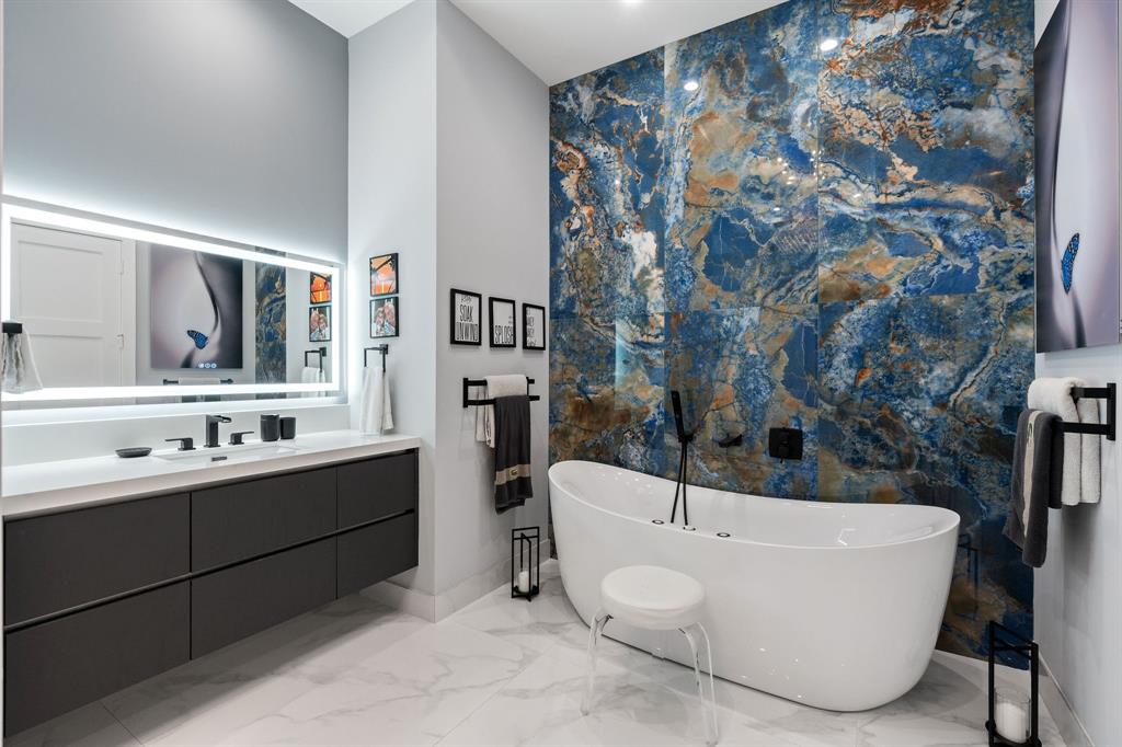 13500 Stirling Road Southwest Ranches, FL 33330 - Photo 39 of 72 a bathroom with a bathtub sink mirror and toilet