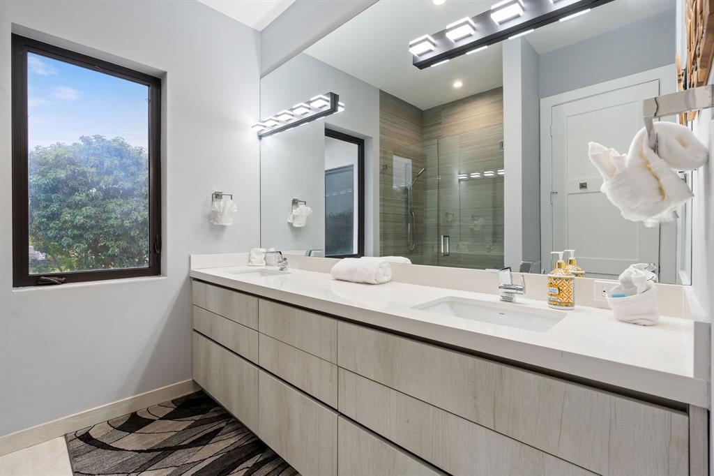 13500 Stirling Road Southwest Ranches, FL 33330 - Photo 42 of 72 a bathroom with a double vanity sink mirror and shower