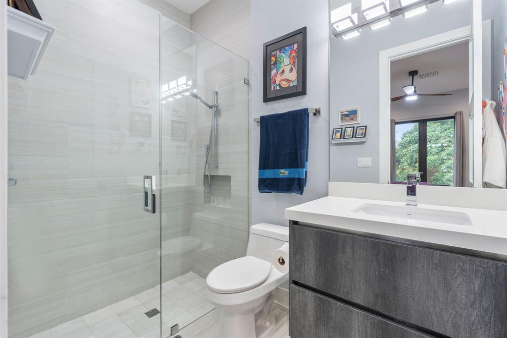 13500 Stirling Road Southwest Ranches, FL 33330 - Photo 48 of 72 a bathroom with a sink toilet and shower