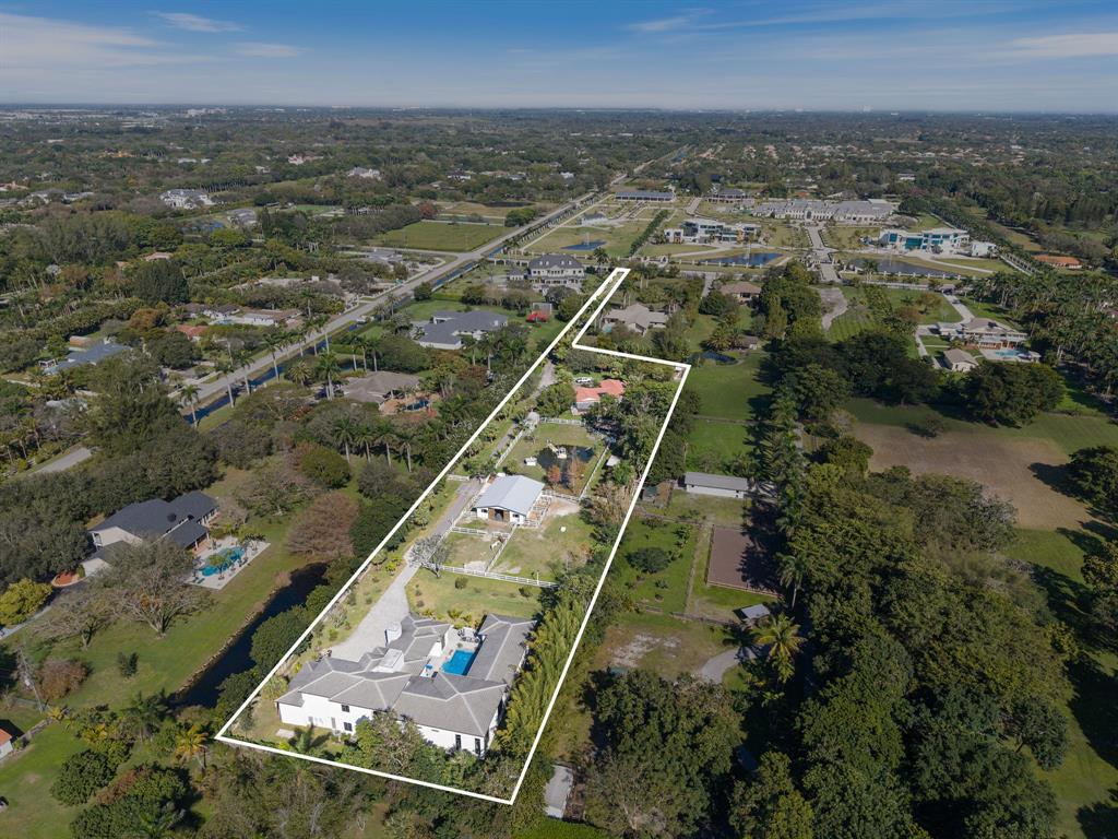 13500 Stirling Road Southwest Ranches, FL 33330 - Photo 81 of 83 an aerial view of a residential houses with outdoor space