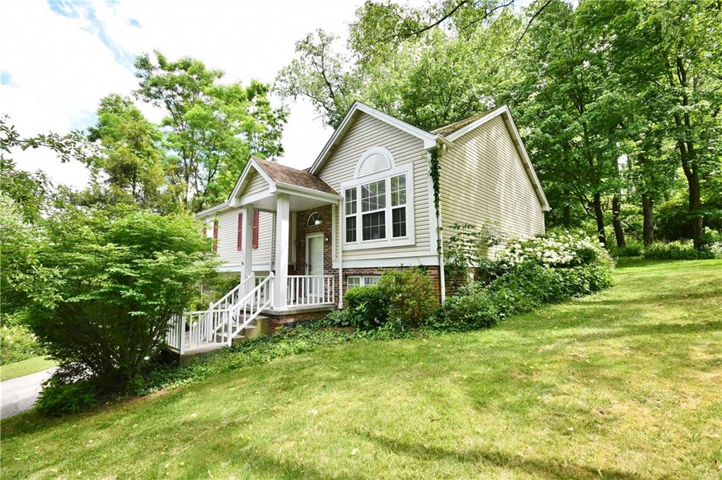Tucked away amongst tress one finds this charming split entry home in a prime Bethel Park location.