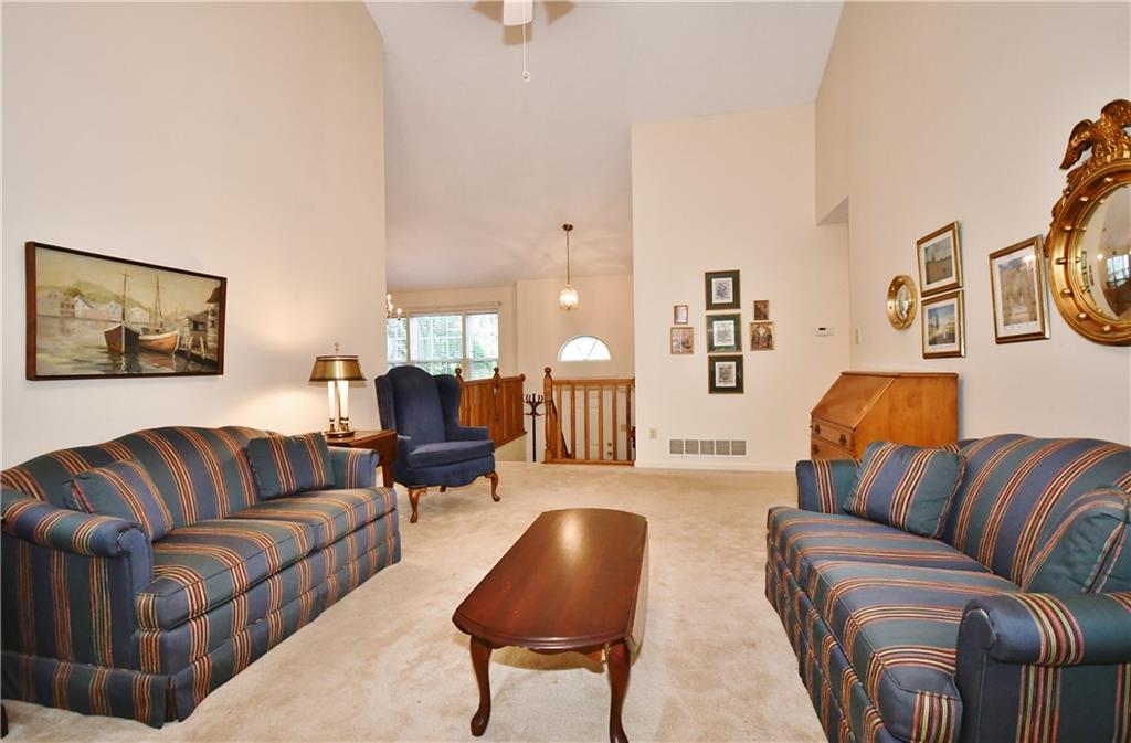 2437 Lytle Road Bethel Park, PA 15102 - Photo 12 of 25 Open and spacious from the great room to the foyer and dining room.