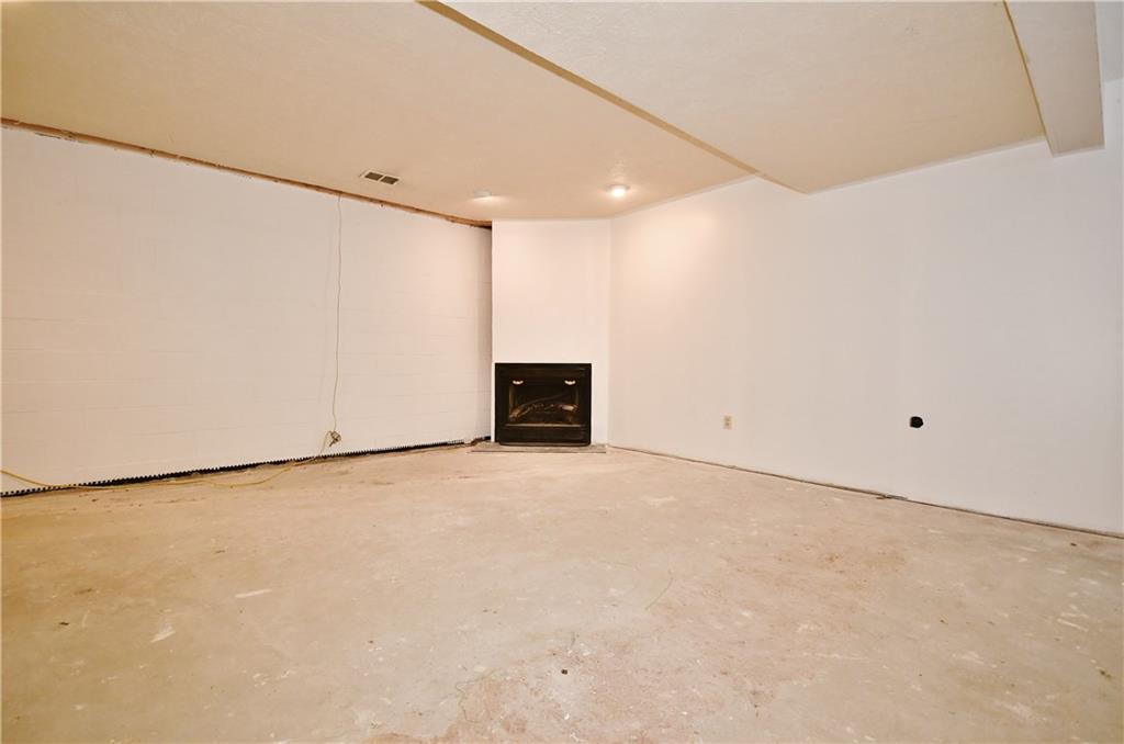 2437 Lytle Road Bethel Park, PA 15102 - Photo 20 of 25 Corner fireplace int the game room area.