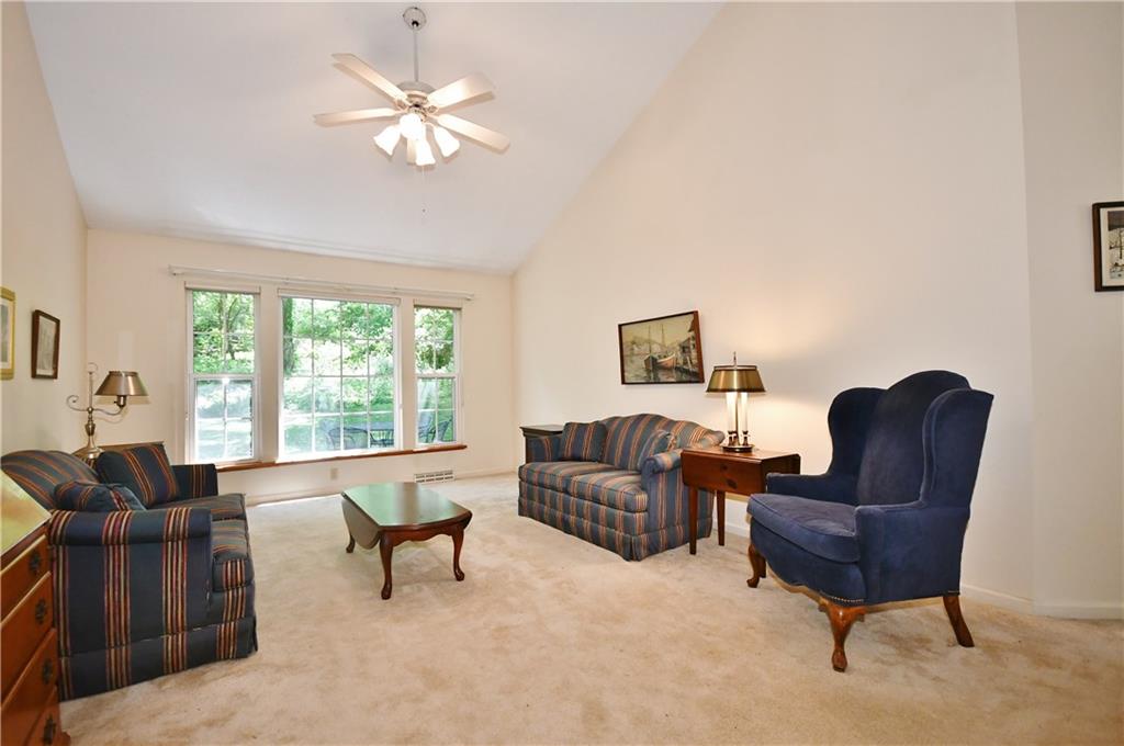 2437 Lytle Road Bethel Park, PA 15102 - Photo 10 of 25 Sunlit spacious great room with a vaulted ceiling.
