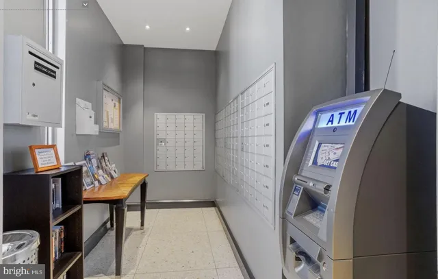 a view of a patio with a table and chairs