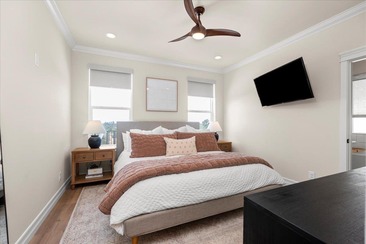 3775 Bell Road Auburn, CA 95603 - Photo 19 of 45 a bedroom with a bed tv and a window