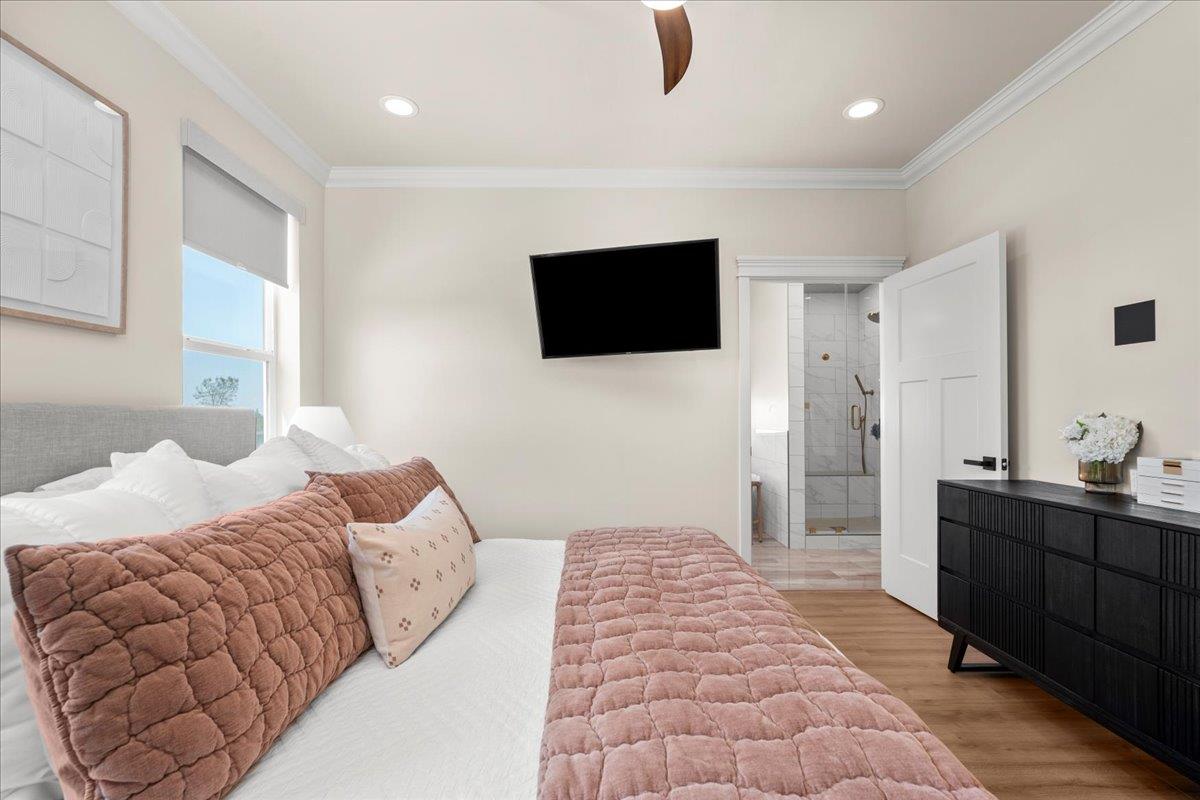 3775 Bell Road Auburn, CA 95603 - Photo 20 of 45 a bedroom with a bed and a flat screen tv