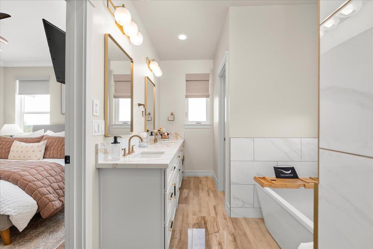 3775 Bell Road Auburn, CA 95603 - Photo 22 of 45 a en suite bathroom with a sink and a mirror