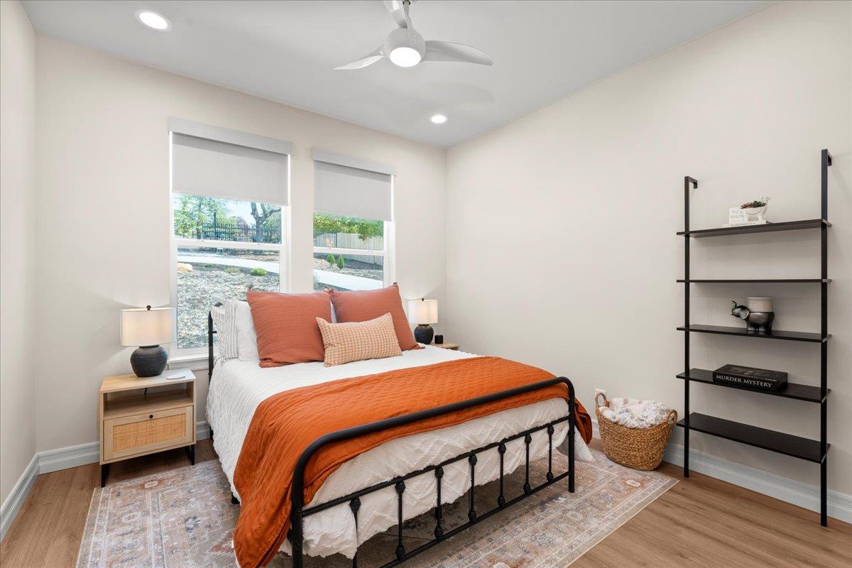 3775 Bell Road Auburn, CA 95603 - Photo 29 of 45 a bedroom with a bed and a night stand