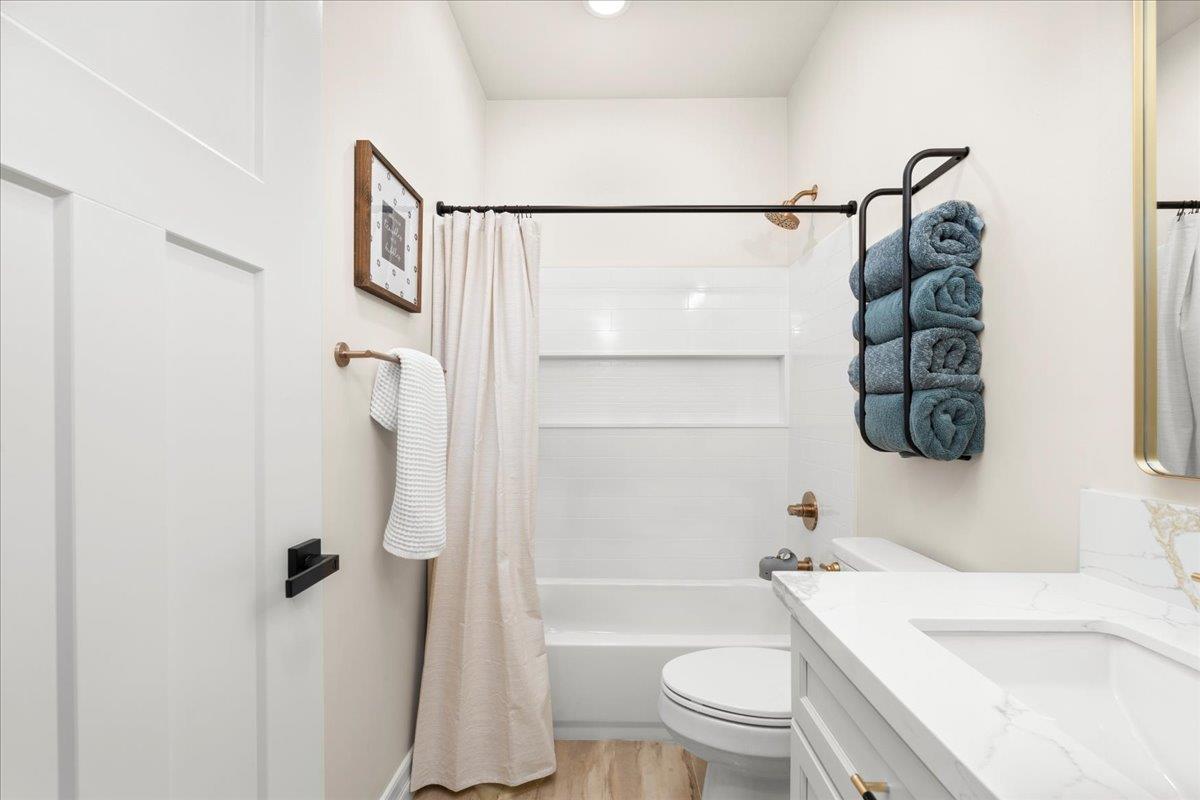 3775 Bell Road Auburn, CA 95603 - Photo 31 of 45 a bathroom with a sink a toilet and shower