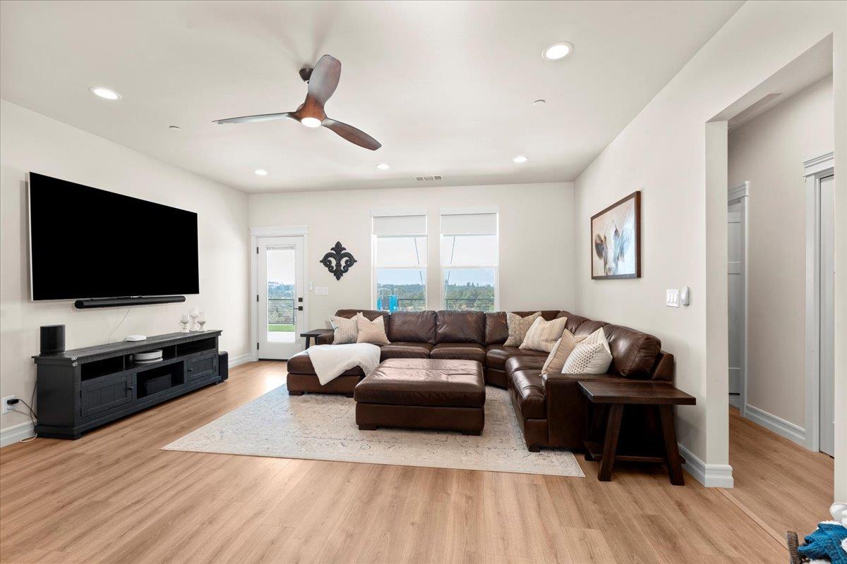 3775 Bell Road Auburn, CA 95603 - Photo 38 of 45 a living room with furniture and a flat screen tv