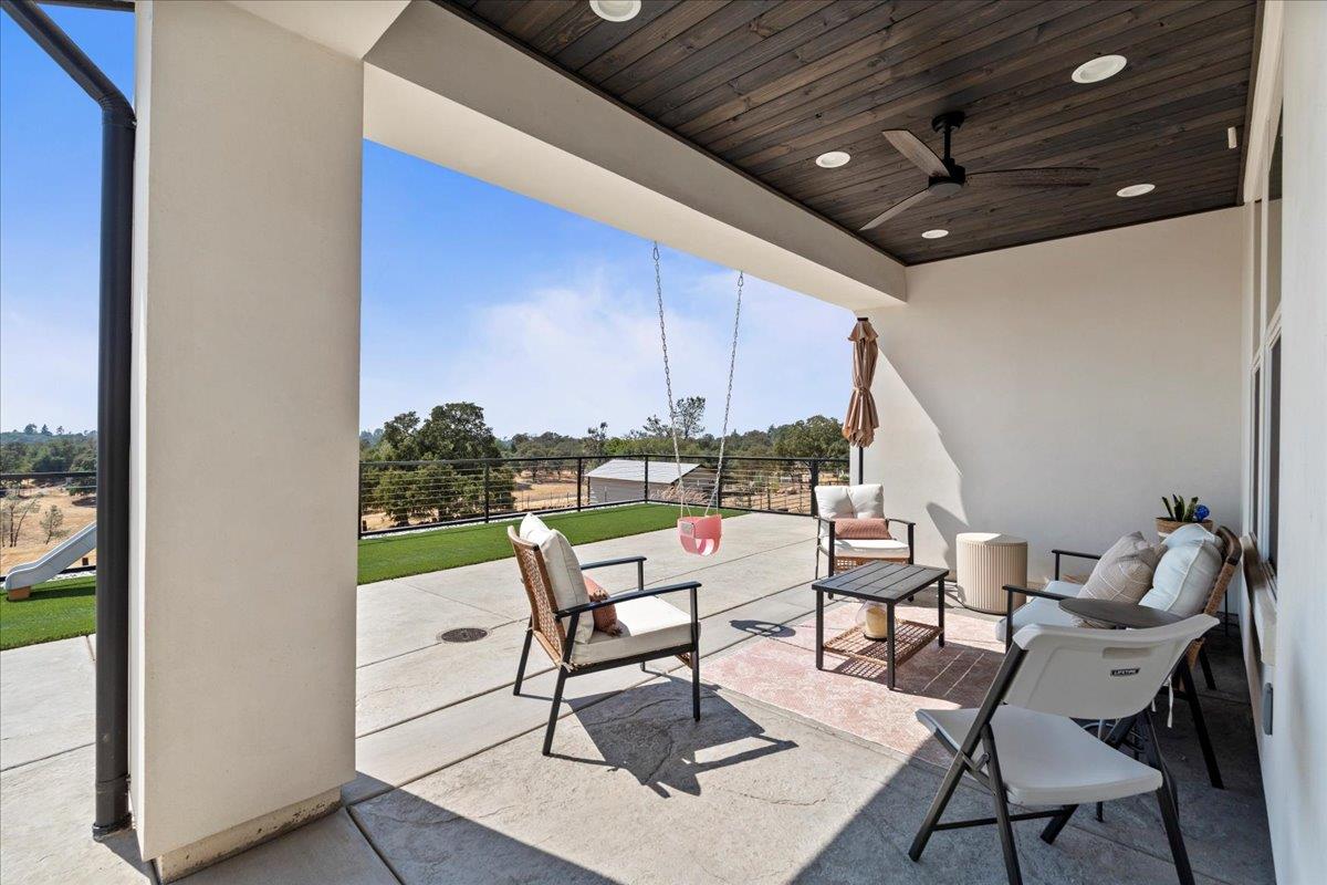 3775 Bell Road Auburn, CA 95603 - Photo 43 of 45 a balcony with chairs and outdoor view