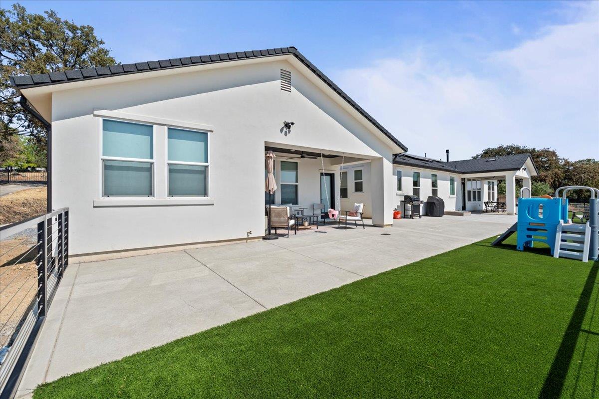 3775 Bell Road Auburn, CA 95603 - Photo 44 of 45 a view of house that has a yard