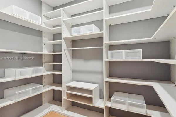 a view of an empty walk in closet