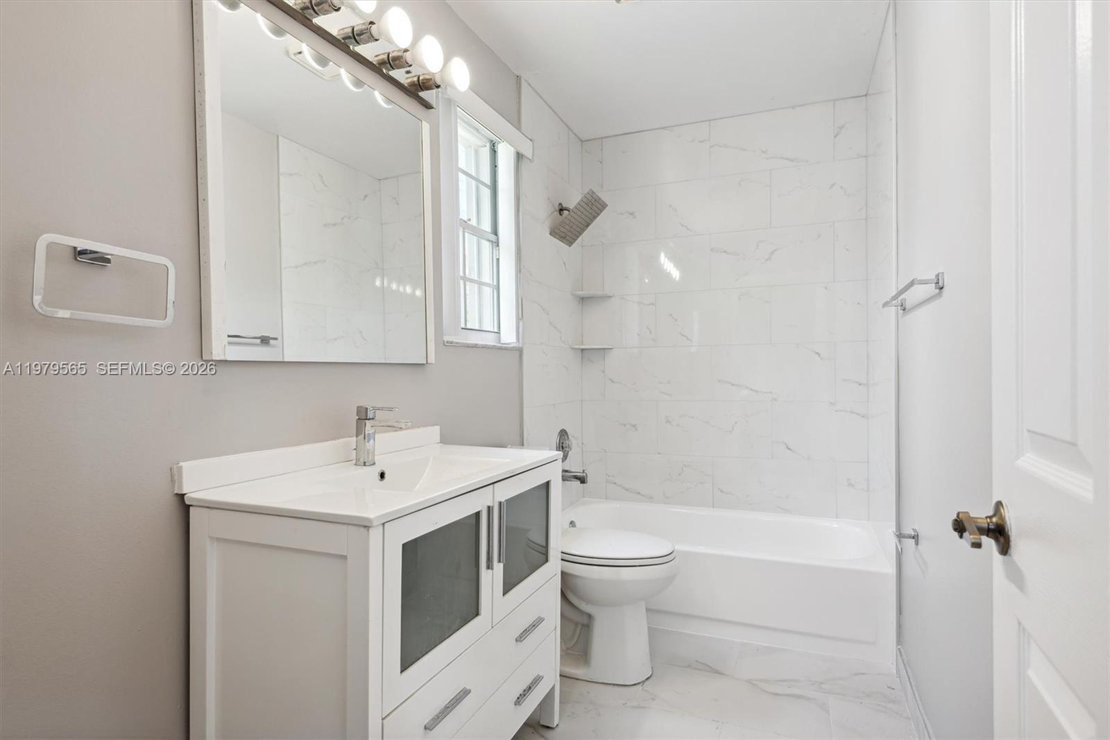 7234 Panache Way Boca Raton, FL 33433 - Photo 18 of 23 a bathroom with a sink toilet and shower