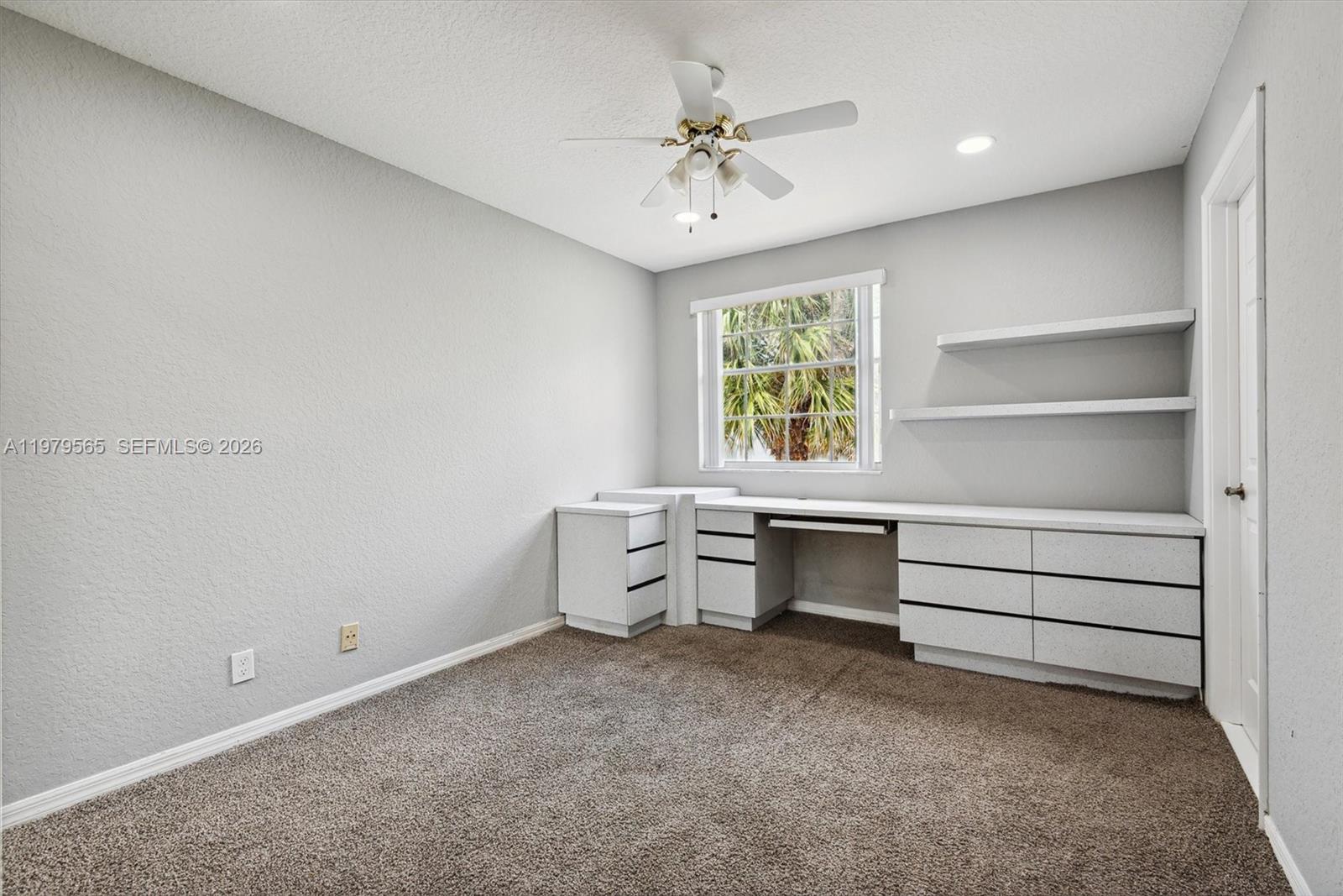 7234 Panache Way Boca Raton, FL 33433 - Photo 19 of 23 a room with furniture and window