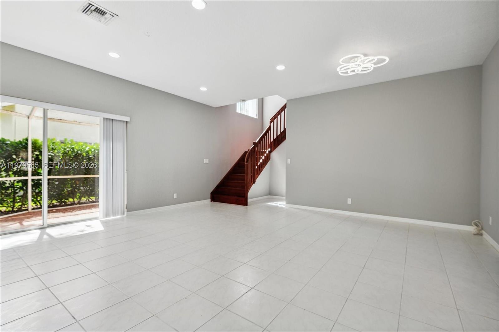 7234 Panache Way Boca Raton, FL 33433 - Photo 5 of 23 a view of an empty room with a window