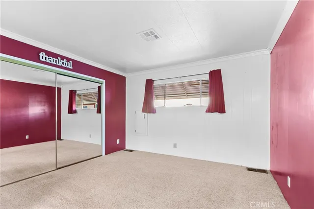 a bathroom with double vanity sink and mirror