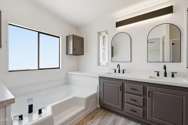 a view of empty room with ceiling fan