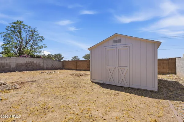 a view of a livingroom with wooden floor