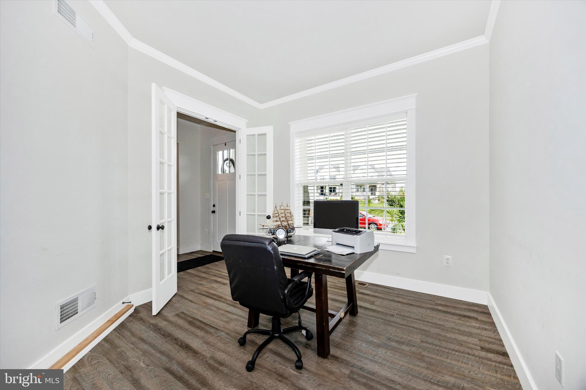 1694 Double Bank Road Frederick, MD 21702 - Photo 17 of 79 a view of a workspace with wooden floor