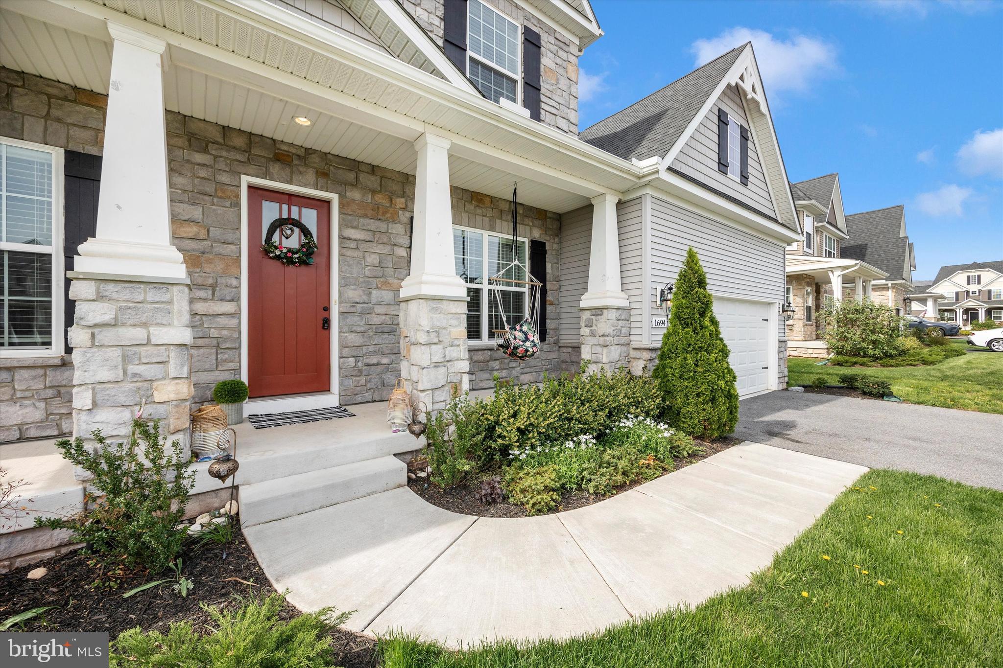 1694 Double Bank Road Frederick, MD 21702 - Photo 2 of 79 a front view of a house with garden
