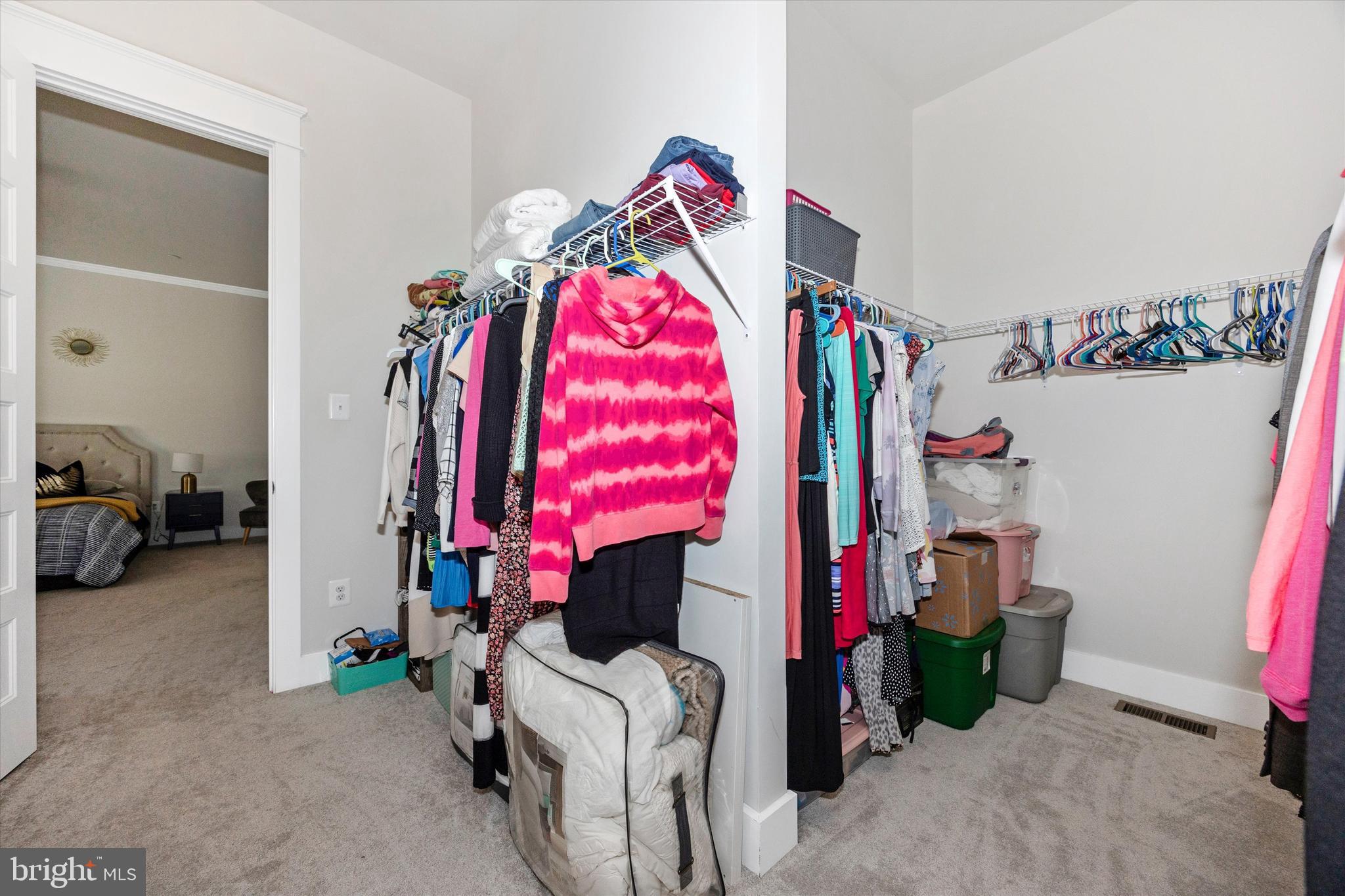 1694 Double Bank Road Frederick, MD 21702 - Photo 29 of 79 a view of walk in closet with clothes and shoes
