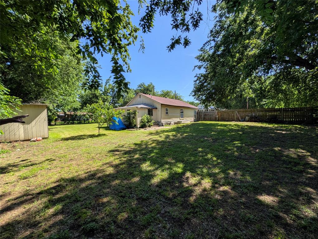 308 Short Street Mansfield, TX 76063 - Photo 20 of 21 a front view of house with yard and trees