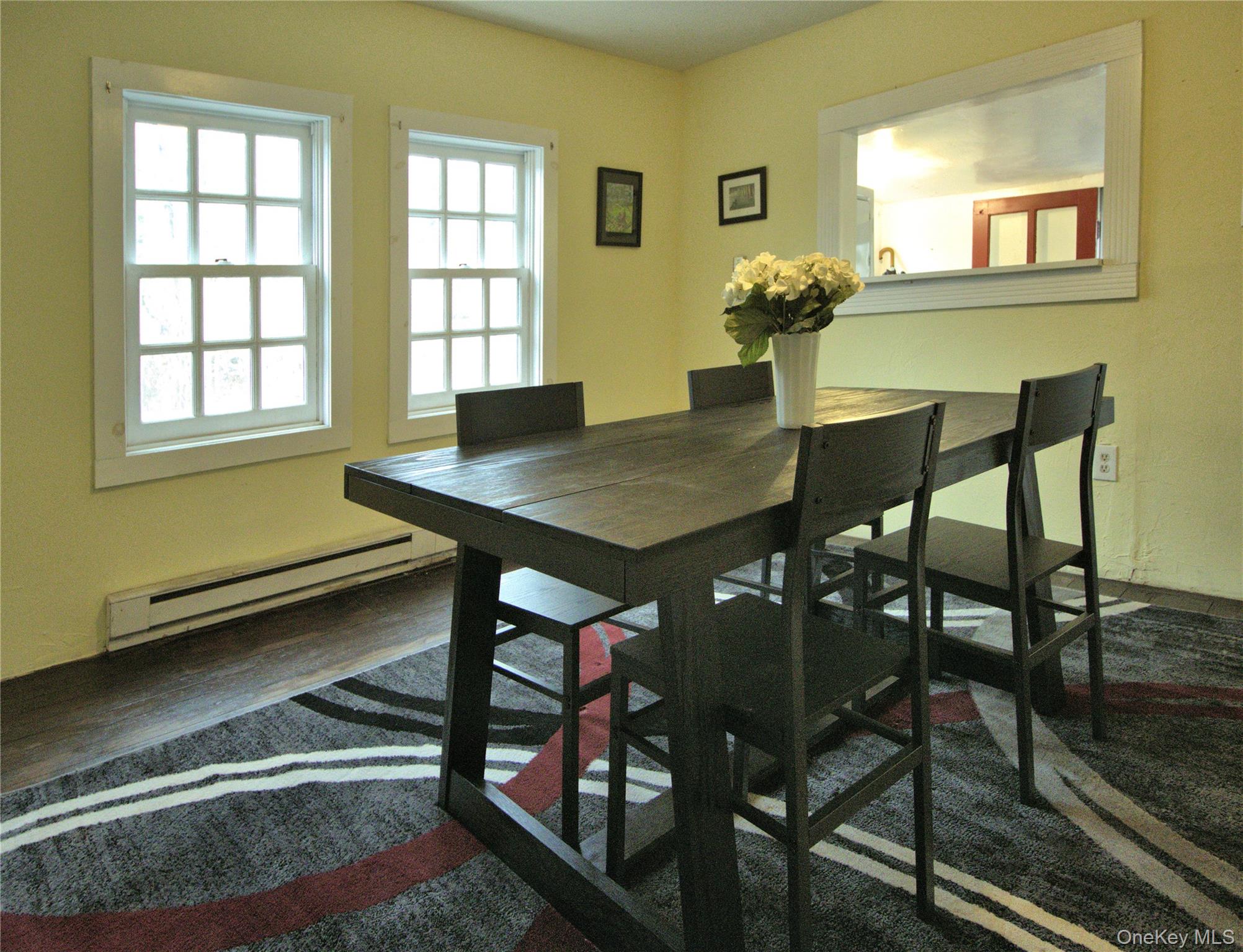 7 State Rte 55 Napanoch, NY 12458 - Photo 11 of 38 a view of a dining room with furniture and window