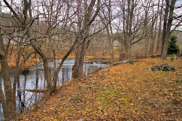 a view of snow on the street