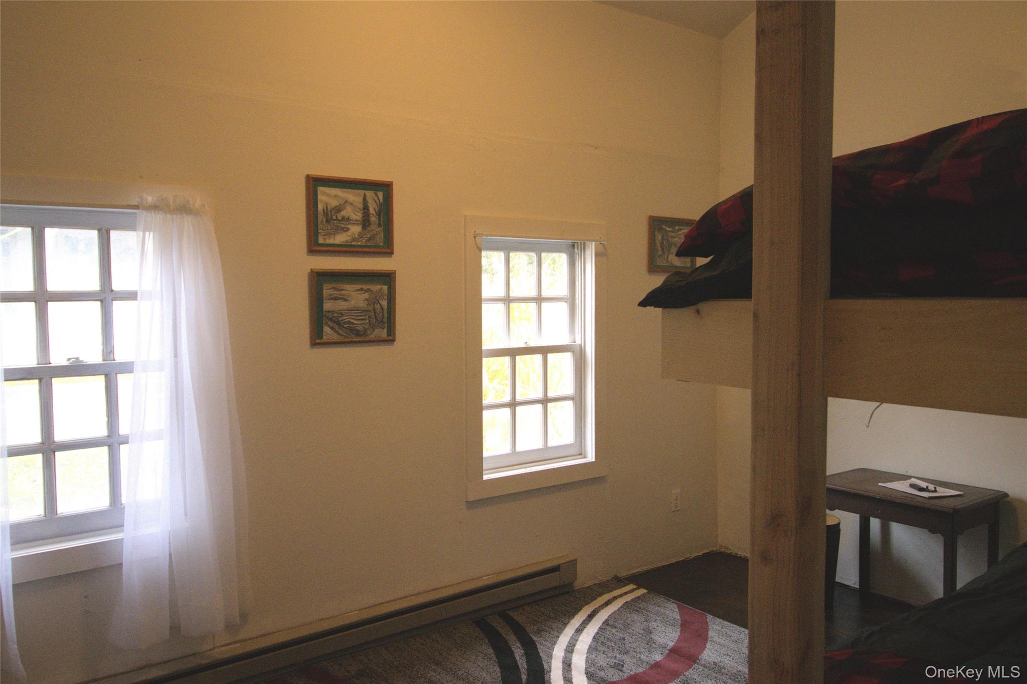 7 State Rte 55 Napanoch, NY 12458 - Photo 24 of 38 a bedroom with a bed and a window