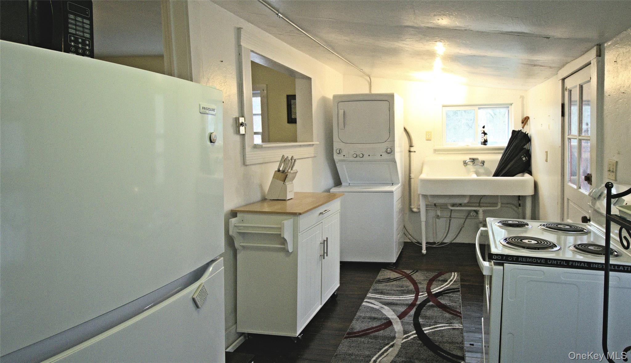 7 State Rte 55 Napanoch, NY 12458 - Photo 31 of 38 a kitchen with a refrigerator and a stove