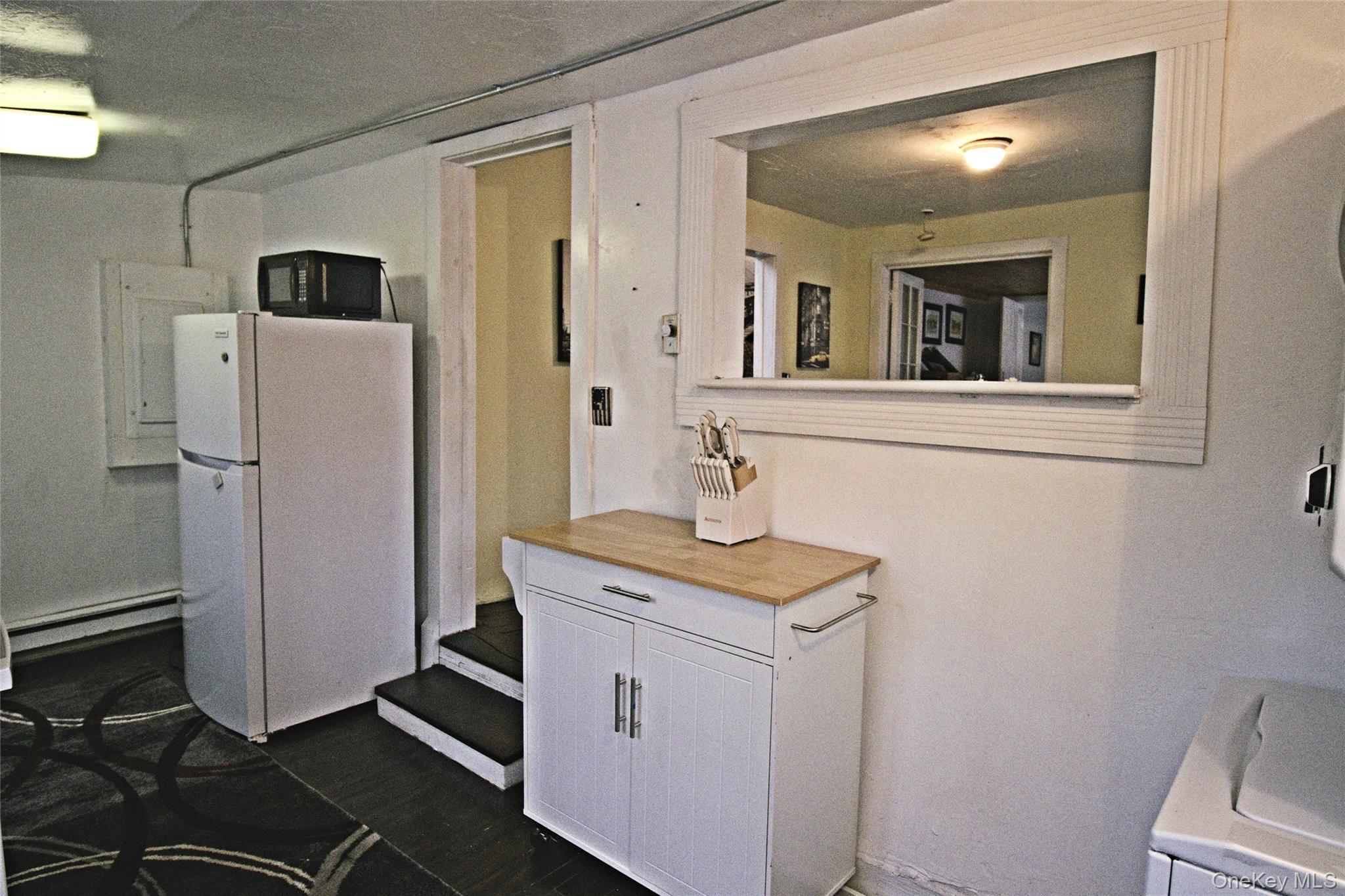 7 State Rte 55 Napanoch, NY 12458 - Photo 32 of 38 a utility room with cabinets washer and dryer
