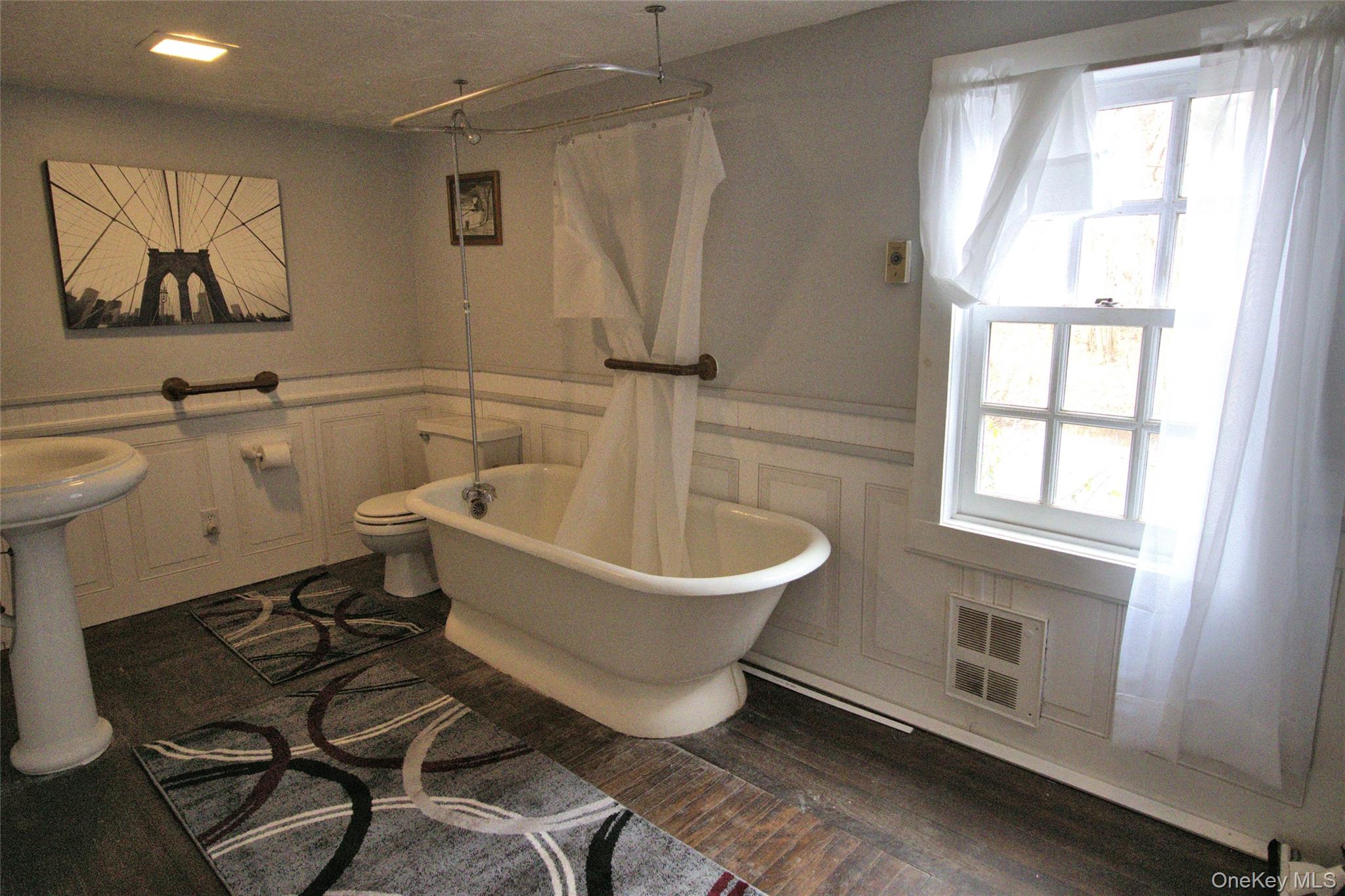 7 State Rte 55 Napanoch, NY 12458 - Photo 5 of 38 a bathroom with a sink and a bathtub